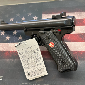 Ruger Mark IV target pistol displayed on a firearm sales counter with a product tag at Old Town Tactical.